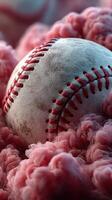 Baseball resting on pink cotton candy during a playful summer carnival at the local fairground photo
