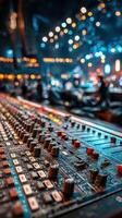 Sound mixer on stage during a vibrant music event showcasing lights and musicians in action photo
