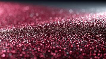 Shimmering red glitter showcasing vibrant texture and light reflection during the evening photo