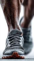 Active runner training intensely with water droplets on footwear in a dynamic fitness setting photo