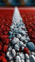 Colorful track surface showcasing the vibrant textures of red and blue granules in a close-up view photo