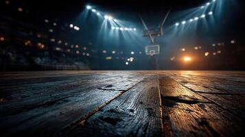 Basketball court in an empty arena illuminated by dramatic lighting during a nighttime event photo