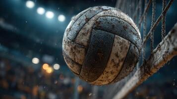 Volleyball in action during a rainy match at an indoor sports arena in the evening photo