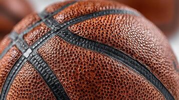 Close-up view of a textured basketball highlighting its intricate details and craftsmanship during a sports event photo