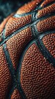 Close-up view of a wet basketball showcasing detailed texture and surface features with drops of water photo