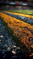 Close-up view of colorful synthetic turf lines on a sports field during daylight hours photo