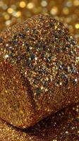 Shimmering golden glitter with vibrant sparkles in a close-up view perfect for art and craft projects photo