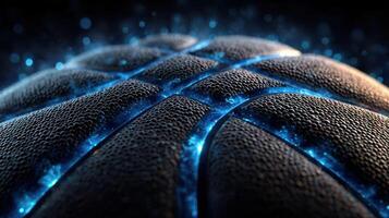 Close-up of an illuminated basketball highlighting its texture and detail during a nighttime game photo