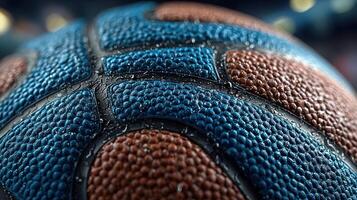 Detailed close-up of a basketball with water droplets reflecting arena lights during game time photo
