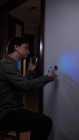 A man is playing with a remote control video