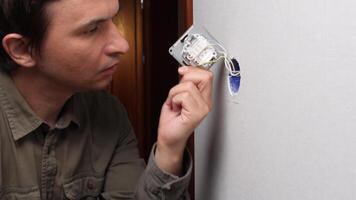 Stressed electrician making mistakes while installing light switch video