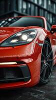Sleek red sports car parked on wet pavement under moody urban lighting during a rainy evening photo