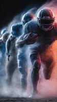 Dynamic football players charging forward on the field during an intense game under dramatic lighting effects photo