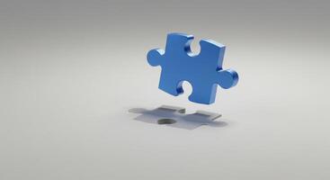 Blue Puzzle Piece Floating Above Shadow photo