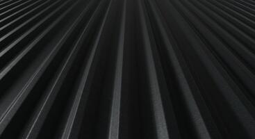 Close Up Texture of Dark Grey Corrugated Metal Panel with Vertical Ribs photo