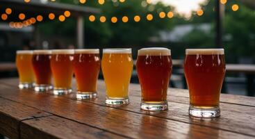 Craft Beer Tasting Flight on Rustic Wooden Table at Bar or Brewery photo