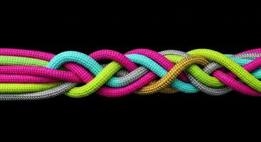Intricate braiding of vibrant colorful cords symbolizing connection and strength photo