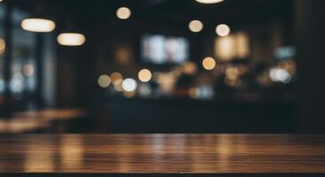Empty wooden table surface with blurred cafe interior and bokeh lights photo