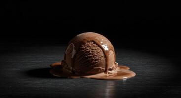 Melting chocolate ice cream scoop dripping on a dark surface photo