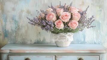 Pink Roses and Lavender Bouquet in a Vintage Vase on a Shabby Chic Table photo