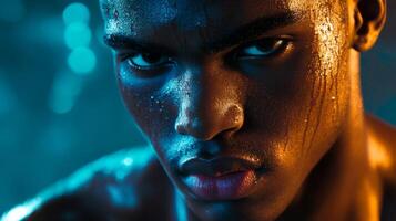 Close-up Portrait of a Man's Face with Glowing Skin and Intense Eyes photo