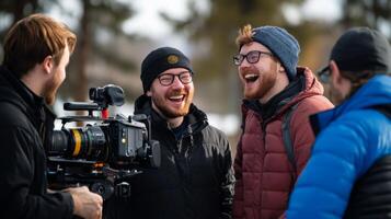 Three Men Laughing While Being Filmed with a Camera photo
