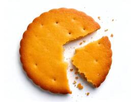 Broken salted biscuit on white background photo