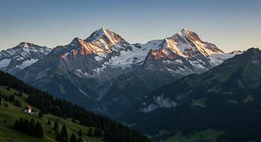 A mountain range with a church in the foreground photo