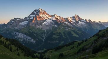A mountain range with a road leading to it photo
