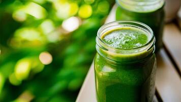 Spinach Smoothie Vibrant spinach smoothie in a glass jar, set against a lush green background, highlighting its refreshing, nutritious, and vibrant qualities. photo