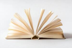Open Book with Fanned Pages - Artistic Still Life on White photo