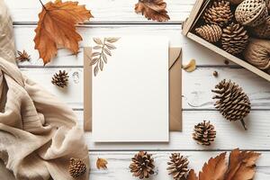 Autumn leaves and pine cones on a wooden table photo