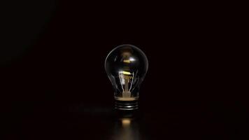 Light bulb on Black background for creative concept 3d Rendering . photo