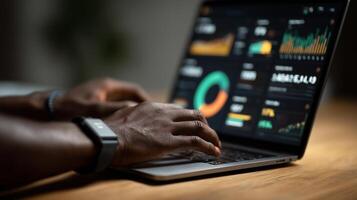 Hands engage with laptop dashboard displaying market statistics and analytics for business insights photo