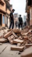 Destruction in urban area after earthquake causing bricks and debris to scatter across the street photo