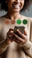 Customer satisfaction expressed through emojis while using a smartphone in a cozy indoor setting photo