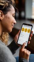 User engages with a satisfaction survey on smartphone, showcasing various emotions in feedback process photo