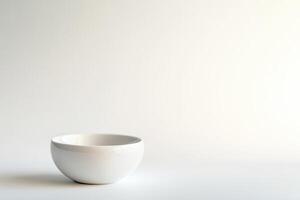 Simple white bowl on a neutral background photo