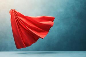 Red fabric in air blue backdrop photo