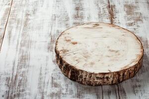 Wooden cutting board rests on rustic table surface photo