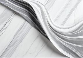 Abstract image of flowing marble texture with dynamic lines and contrasting shades of black, white, and gray photo
