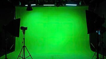 Professional green screen studio with lighting equipment ready for and photography production photo