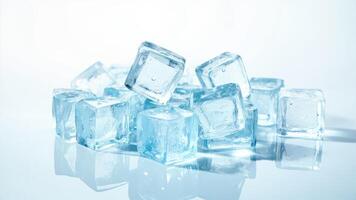 Transparent ice cubes displayed against a clean white and blue background for refreshment concepts photo