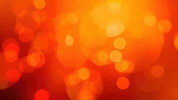 Abstract bokeh background with vibrant orange and red hues perfect for digital art and graphic design projects photo