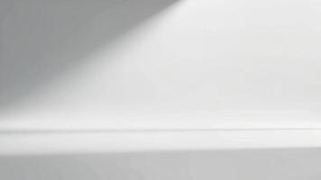 Minimalist white studio background featuring subtle shadows and blank space for creative design and product placement photo