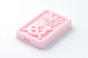 Small, rectangular, light pink object with embossed design photo