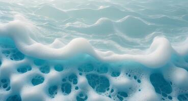 A close up of a wave with foam on it photo