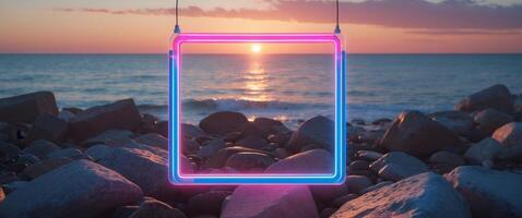 A neon sign on a rock with the sun setting in the background photo