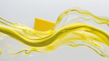 A yellow liquid flowing over a white surface photo