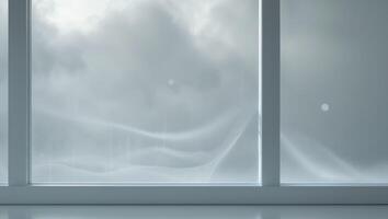 A room with a window with a view of the sky photo